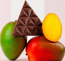 Load image into Gallery viewer, Chocolate bar with a geometric pattern on top of two mangoes.